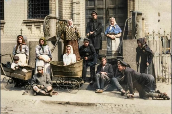 Colorized photo of 1913, published in issue 31 of August 17 of the magazine "Ogonyok" under the title "Cripples, the sick and the poor at the porch of the church on the Glass".

The Church on the Glass, aka "The Church of the Mother of God of All Who Sorrow with Groshikami" on Obukhovskaya Oborona Avenue in St. Petersburg was blown up in the 1930s and reconstructed a couple of years ago under the project of "ACM Group".