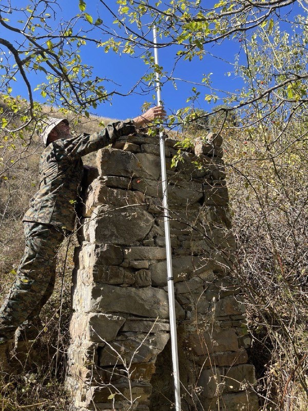 Employees of the Dzheyrah-Assinsky Museum-Reserve carried out planned work on accounting and fixation of previously unrecorded objects of cultural heritage.

This time the trip was made to the rarely visited tower complex in the eastern part of the Guloikhi Gorge - "Besht", where the ruins of four residential towers are preserved.

The described monument - a pillar-shaped sanctuary or, as it is popularly called, sieling - is located 300 meters west of the complex. Its height is 2.50 m, length is 1.10 m, width is 0.65 m. Below, on the facade of the object there is a lancet beggar with a height of 0.8 m.

In his studies, the Ingush historian and archaeologist M.B. Muzhukhoev believed that pillar-shaped sanctuaries complete the evolution of local religious monuments. And some scientists, on the contrary, believe that pillar-shaped structures are the primary form of religious buildings.

M.B. Musukhoev also claims that the construction of sielings was performed in memory of deceased ancestors. These monuments served as a symbol of veneration and respect for ancestors, and were believed to provide invisible protection to their descendants.

Ethnographic descriptions acquaint us with monolithic "pillars" - sanctuaries known as "Sielings", indicating their mythological connection with the cult of "the sun god" and lightning "Selya". A typical example of the sanctuary-monument is the sielings near the village of Erzi, Egikal, Targim, Niy, Vovnushki, Ozdeche, etc. in Ingushetia.

Researcher F.M. Kostoeva believes that in ancient times, the term "seeling" was used to refer to a high quadrangular stone column facing south, with a flat or gable top and a small niche at the base. The sielings were collected from raw stone before human growth and fixed to a lime or clay solution ("markhal"). Such stone structures were erected at crossroads, at towers or crypts.

As for this structure, we did not find its description in any written source. Employees carried out measurements of the object, photofixation. The monument will be included in the list of identified objects of cultural heritage of the republic, as well as put into scientific circulation, and it will be of interest to all who are interested in the history of Ingushetia.