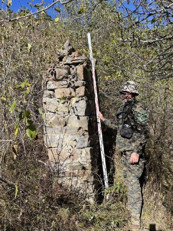 Employees of the Dzheyrah-Assinsky Museum-Reserve carried out planned work on accounting and fixation of previously unrecorded objects of cultural heritage.

This time the trip was made to the rarely visited tower complex in the eastern part of the Guloikhi Gorge - "Besht", where the ruins of four residential towers are preserved.

The described monument - a pillar-shaped sanctuary or, as it is popularly called, sieling - is located 300 meters west of the complex. Its height is 2.50 m, length is 1.10 m, width is 0.65 m. Below, on the facade of the object there is a lancet beggar with a height of 0.8 m.

In his studies, the Ingush historian and archaeologist M.B. Muzhukhoev believed that pillar-shaped sanctuaries complete the evolution of local religious monuments. And some scientists, on the contrary, believe that pillar-shaped structures are the primary form of religious buildings.

M.B. Musukhoev also claims that the construction of sielings was performed in memory of deceased ancestors. These monuments served as a symbol of veneration and respect for ancestors, and were believed to provide invisible protection to their descendants.

Ethnographic descriptions acquaint us with monolithic "pillars" - sanctuaries known as "Sielings", indicating their mythological connection with the cult of "the sun god" and lightning "Selya". A typical example of the sanctuary-monument is the sielings near the village of Erzi, Egikal, Targim, Niy, Vovnushki, Ozdeche, etc. in Ingushetia.

Researcher F.M. Kostoeva believes that in ancient times, the term "seeling" was used to refer to a high quadrangular stone column facing south, with a flat or gable top and a small niche at the base. The sielings were collected from raw stone before human growth and fixed to a lime or clay solution ("markhal"). Such stone structures were erected at crossroads, at towers or crypts.

As for this structure, we did not find its description in any written source. Employees carried out measurements of the object, photofixation. The monument will be included in the list of identified objects of cultural heritage of the republic, as well as put into scientific circulation, and it will be of interest to all who are interested in the history of Ingushetia.
